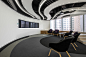 GroupM - WPP Campus : GroupM is the parent company of all the WPP 'M' agencies and provides support and shared services. The central theme around the staircase ties all the GroupM companies together around a vertical village consisting of pantry and mixed