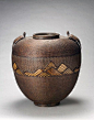 Jar-shaped flower basket with turtle decoration by Chikuryosai (Japanese) | ca. 1875 - 1925 |  Bamboo (madake variety) rattan, copper; pine needle: 