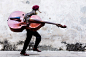 Cuban_Man_with_Large_Moustache_Walking_with_Double_Bass