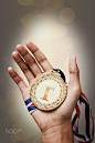 hand holding up a gold trophy cup as a winner in a competition by Aziz Albumkasih on 500px