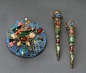 A group of gilt metal clothing accessories inlaid with colored glass, jade and kingfisher feathers Late Qing dynasty