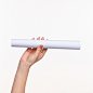 white-cylinder-props-female-hands-white-background_155003-20492