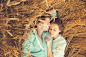 Young couple in love outdoor.Stunning sensual outdoor portrait of young stylish fashion couple posing in summer in  field