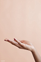 Female hand on a beige background | premium image by rawpixel.com / McKinsey