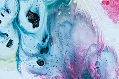 抽象的彩色背景。用丙烯颜料在水中作画。油漆的质感发挥