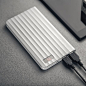 15,000 mAh high capacity wavy power bank.  Available in Black or Silver.  Built in LCD indicator shows battery level.