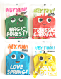 four bags with different designs on them sitting in front of a white wall and one has the words, hey yum, magic forest, traci