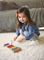 Little girl playing the xylophone Free Photo