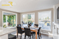Inspiration for a mid-sized transitional medium tone wood floor and beige floor kitchen/dining room combo remodel in Seattle