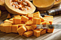 Orange long pumpkin cut into pieces - 免版稅南瓜圖庫照片