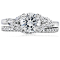 Monique Lhuillier Jardin Diamond Engagement Ring in Platinum (1/4 ct. tw.) | Blue Nile : Distinctive marquise-cut diamonds gracefully accent the center diamond of your choice, creating a romantic floral motif.