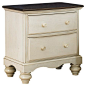 Bring a timeless touch to your master suite or guest room with this classic wood nightstand, featuring a scalloped apron and 2-tone finish. ...: 