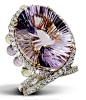 amethyst centerpiece accented with diamonds.... stunning masterpiece.