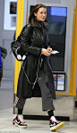 Leather lady: While Bella is well known for her smouldering pout, she proved she is just a... #bellahadid