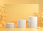 Premium Photo | Modern minimal stone podium with foreground tropical plant depth of field beige color background 3d render