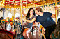couple having fun on romantic merry go round ride by Joshua Resnick on 500px