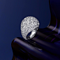 A Graff bombe diamond Ring on blue background