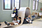 Flying carpet working/reading spaces along hallway