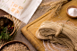 Packaging │急食速麵 Taiwan Flour Vermicelli : 急食速麵使用臺中大甲地區所生產的臺中選二號小麥，搭配歐式石磨製粉，在麵線上也能清楚看見製程中留下的麥子麩皮，讓麥香看得見也吃得到，因此在包裝上採用白棉袋，讓麵線的形象若隱若現，並大面積的繪出產地大甲的面貌，大安溪映著鐵砧山，保護著小麥不受鳥害的趕鳥球在沖積平原上搖曳著，成為整個圖面的小亮點。在特殊節日或活動時，包裝正面還能加上一片腰封，使用撕斷線的設計，將所要附贈的食譜、資訊等藏在裡頭，用設計凸顯臺灣農產加工品的特色氛圍。