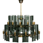 Curved glass and brass chandelier attributed to Fontana Arte | From a unique collection of antique and modern chandeliers and pendants at http://www.1stdibs.com/furniture/lighting/chandeliers-pendant-lights/