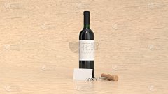 一瓶带名片和开瓶器的红酒