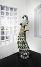 The Emerald Omar : Life size peacock created using hand-cut Chiyogami papers, gold foil and Swarovski crystals.
