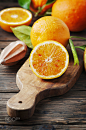 Fresh sweet oranges on the wooden table by Oxana Denezhkina on 500px