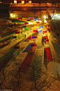 ~French-canadian design firm atomic3's most recent work, 'éclats de verre', "developed for luminothérapie 2012.  The human-scale colored panel maze has been displayed in the heart of montreal, quebec, canada, resembling a massive stained-glass window