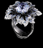 #jewellerytheatre#,flowers ring
18K white and black gold 
138 diamonds 0.87ct, 1 aquamarin/topaz 10.50ct,253 blue sapphires 2.20ct