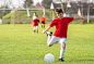 Boys kicking ball by Dusan Kostic on 500px