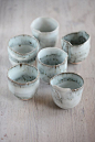 6 Hand built stoneware and Porcelain 4 oz cup with pretty blue glaze: 