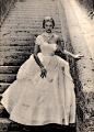 Jean Patchett in a gown by Ceil Chapman and jewelry by Schreiner, 1951