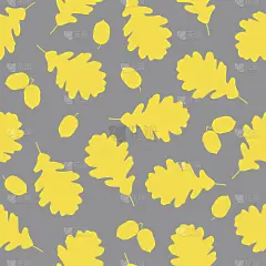 灰色背景下黄色的橡树叶和橡子的剪影。