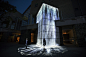 Universe of Water Particles on Bunkanomori Park | teamLab : We reproduced the Bunkanomori Park building in 3D in a virtual three-dimensional space. The movement of water was then simulated as if it was a waterfall flowing over the shape of the building. T