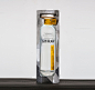 GIN RAW DISPLAY : The GinRaw is a premium gastronomic Gin produced in Barcelona by Mediterranean Premium Spirits S.L. and contained within a clean, transparent bottle. Like a new-found joy fossil, GinRaw has been protected by a rough monomaterial block. I