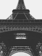 A black-and-white shot of the bottom of the Eiffel Tower