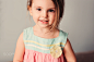 cute toddler girl playing at home on couch