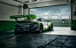 Porsche 911 with Andreas Hempel : The latest Porsche 911 GT3 R. White with lizard green accents and low to the ground this bad boy calls the race track his home.Andreas Hempel and his crew were sent to the speedway in Vallelunga, Italy to capture its capa