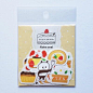 This may contain: a package of stickers with some food on it
