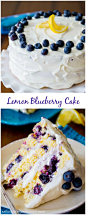 Sunshine-sweet lemon layer cake dotted with juicy blueberries and topped with lush cream cheese frosting!: 