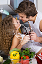 Young beautiful couple in their kitchen