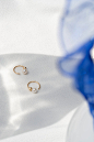 VOYAGE BUBBLE TWIST EARRINGS : Our lovely VOYAGE BUBBLE TWIST Earrings will flow delicately into your ear thanks to their flexible material. Simply twist the earrings to open, put them in your ear like a normal earring and twist them back to close. The de