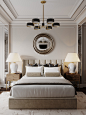 a large bed sitting in a bedroom next to two lamps on either side of it