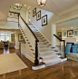 Classic Chic Home: Traditional White and Dark Wood Staircases..  Bannister in entryway.: 