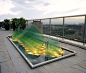 Another design by SWON is the Glass Rock Garden, pictured above. It is a 14′x4′ stainless steel pond was constructed containing 3 sculptured glass rocks of 1/2 inch plate glass. The glass rocks are secured in a metal frame and covered by black river rocks