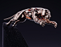 Leaping Jaguar : Stylized sculpture of a leaping Jaguar balancinganatomical features with reduced and abstractized forms.Sculpture in the limited serie of 50 units is available for purchase, for more information on manufacturing and producing the piece, c
