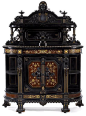 An American Renaissance Revival parcel-gilt, carved and ebonized cabinet. Herter Brothers, New York, c. 1872: 