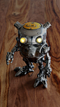 Eddie the Robot by Paul Braddock. 3D printed 30cm tall with LED eyes.