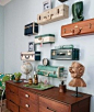 vintage suitcases made into shelves. Perfect for suitcases that are too funky inside to use.