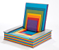 Rainbow Book Chair by Chen Liu : A book-shaped chair that's designed for use in a library. It would be really cool in the library's kids section or a school for a more playful atmosphere.